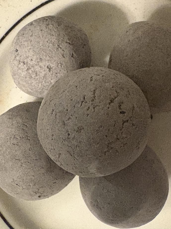 Black candy with crumbs inside