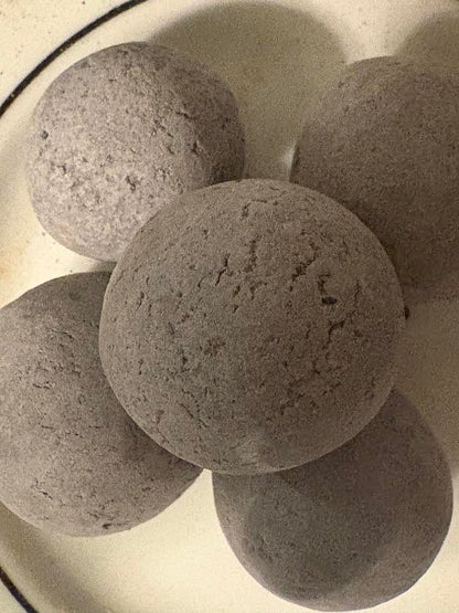 Black candy with crumbs inside