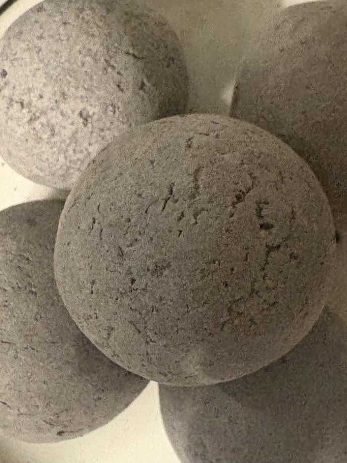 Black candy with crumbs inside