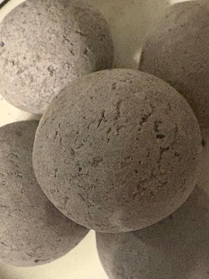 Black candy with crumbs inside