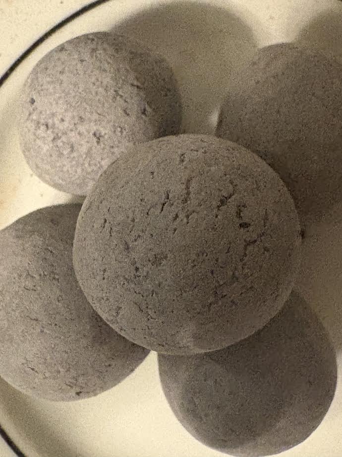 Black candy with crumbs inside
