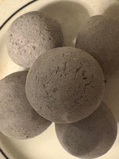 Black candy with crumbs inside